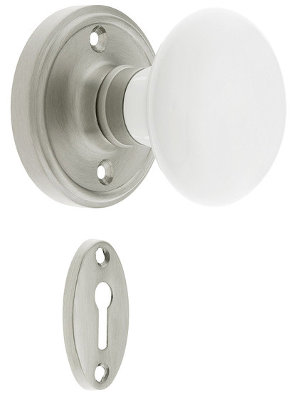 Classic Rosette Mortise Lock Set With White Porcelain Door Knobs in Satin Nickel.